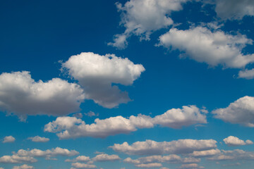 white clouds in the blue sky