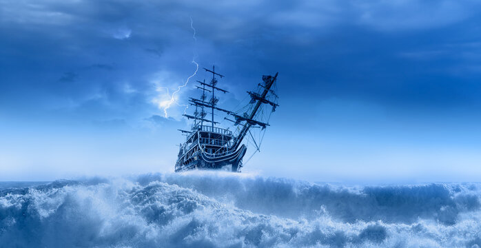 Sailing old ship in a storm sea in the background stormy clouds with lightning