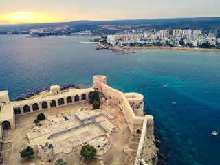 Fototapeta premium Ancient fortress named Kizkalesi or Maiden Castle. Aerial of castle and town