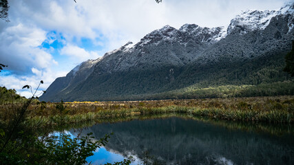 Naklejka na ściany i meble Low shot from Mirror lake to Triangle peaks, Newzealand