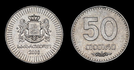 Georgian coin 50 tetri on black background
Text: 50 tetri, Georgia, Strength in unity