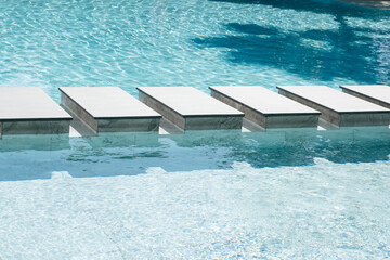 Fototapeta na wymiar Path block on swimming pool surface.