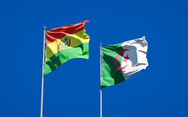 Beautiful national state flags of Algeria and Bolivia together at the sky background. 3D artwork concept.