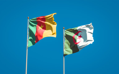 Beautiful national state flags of Algeria and Cameroon together at the sky background. 3D artwork concept.
