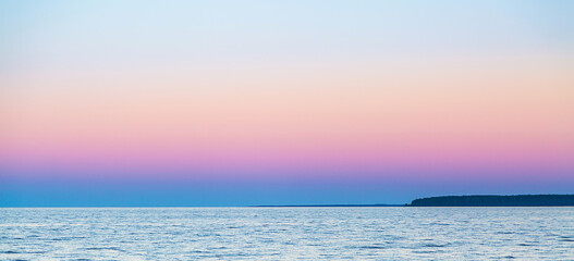 sky after sunset, gradient pink, purple sky colors, beautiful sky, coastline on the horizon