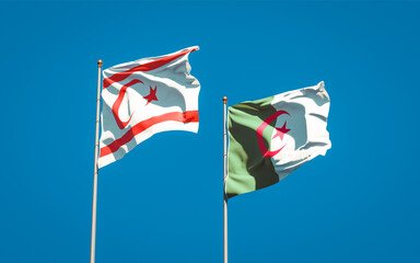 Beautiful national state flags of Turkish Republic of Northern Cyprus and Algeria together at the sky background. 3D artwork concept.