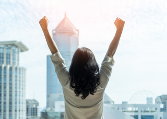 Woman power and girl strength in business achievement, winning and success with strong...