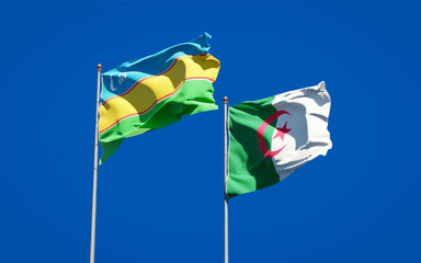 Beautiful national state flags of Karakalpakstan and Algeria together at the sky background. 3D artwork concept.