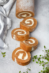 Pumpkin cake roll with cream cheese filling