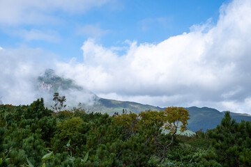 View of cloudy mountain ranges by Lake Rausu