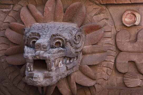 Closeup of a quetzalcoatl head in teotihuacan