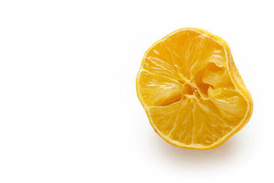 squeezed lemon on a white background