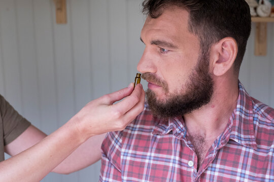 Alternative therapist and man during a consultation, using EFT tapping techniques therapy 