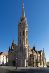 Fototapeta na wymiar Matthias Church - Matyas Templom - at sunny day in historic center of Budapest, Hungary