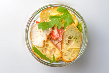 Healthy food - mix vegetable salad served in a bowl over white background. Healthy eating, delicious snack or dinner.