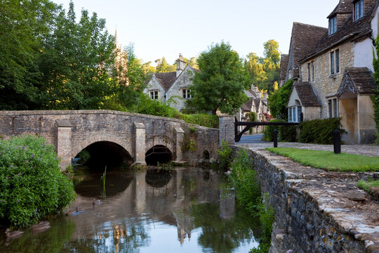 Bridge over River Bybrook in the village of Castle Combe, Wiltshire, UK.
