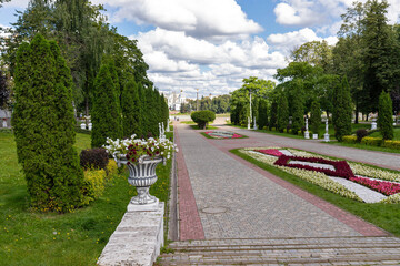 Fototapeta na wymiar Tver, Tver region. Bright summer day in the city garden. Picturesque clouds