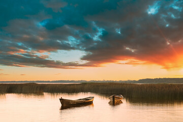 Wooden Rowing Fishing Boats In Beautiful Summer Sunset On Lake. Nature Of Belarus