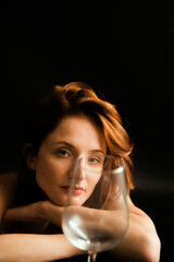Color portrait of  girl with  glass of water