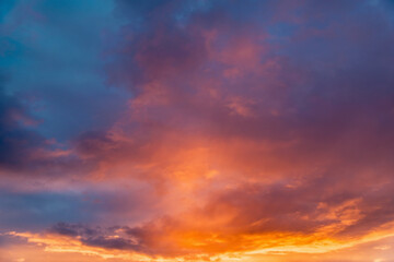Naklejka na ściany i meble Amazing cloudscape on the sky at sunset time after rain