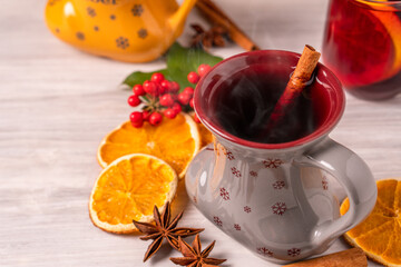 German tradition winter Christmas market new year holidays festival drink Gluhwein Mulled sweet hot warm red Wine with spices citrus aromatic cinnamon star anise