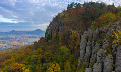 Kisapati, Hungary - Aerial panoramic view of volcanic basalt organs at Szent Gyorgy-hegy with moody tones, warm autumn colored trees.