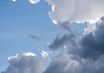 Fototapeta na wymiar White and gray cloud formation on a blue sky