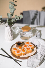 Sushi roll Philadelphia with salmon and caviar