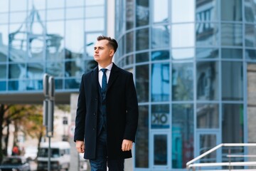 young business man, wearing stylish classic suit