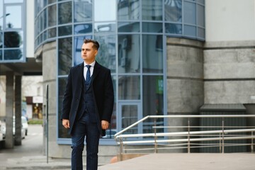 Fashion shot of a handsome young man in elegant classic suit. Men's beauty, fashion.