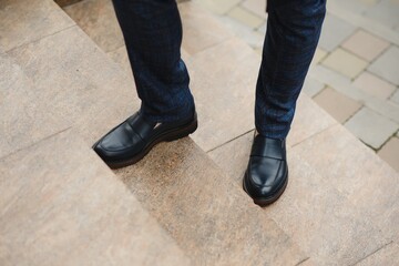 Stylish male person wearing trendy shoes