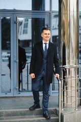 Fashion shot of a handsome young man in elegant classic suit. Men's beauty, fashion.