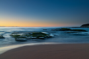 Clear skies and soft seas, dawn at the beach