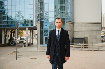 Fashion shot of a handsome young man in elegant classic suit. Men's beauty, fashion.