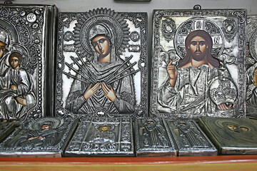 Fototapeta premium Kalambaka, Greece - September 17, 2019: Orthodox icons in a church shop, church faith concept