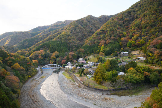 The Japanese countryside in the fall colors of autumn leaves