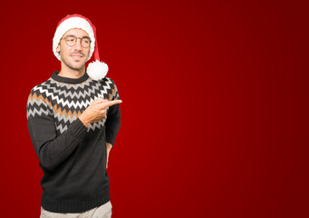 Christmas - Young man gesturing