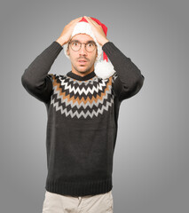 Christmas - Young man gesturing