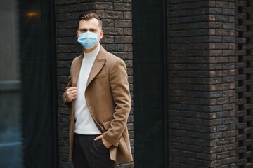 portrait of a businessman in a protective mask