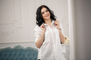 business portrait of a young female businessman. Dressed in a white shirt. Business style concept