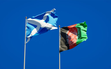 Beautiful national state flags of Scotland and Afghanistan together at the sky background. 3D artwork concept.