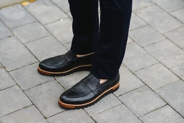 Male elegant shoes and trousers.