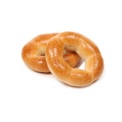 Two freshly baked bagels isolated on white background