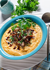 Pumpkin soup with mushrooms and coconut milk