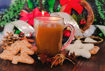 Obraz na płótnie Canvas hot drink and christmas gingerbread cookie
