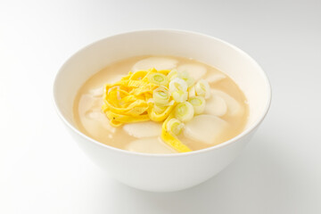 Rice cake soup on a white background