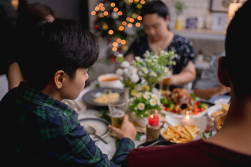Asian portrait, Group of friends has a party and drinks beer in the house.