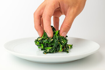 Spinach herbs on white background