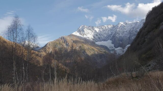 clouds float over a glacier in the Caucasus mountains in Sochi