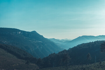 Naklejka premium Foggy mountains in Taurus, Adana. Atmospheric mood and background.